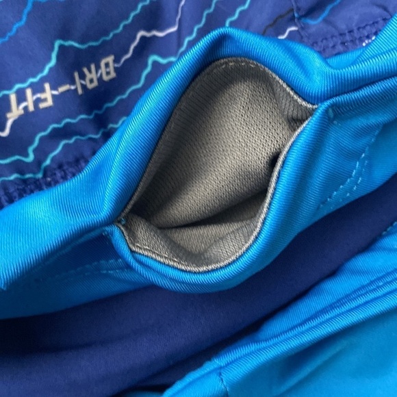 NIKE blue running shorts with small pocket and drawstrings. - Picture 9 of 9